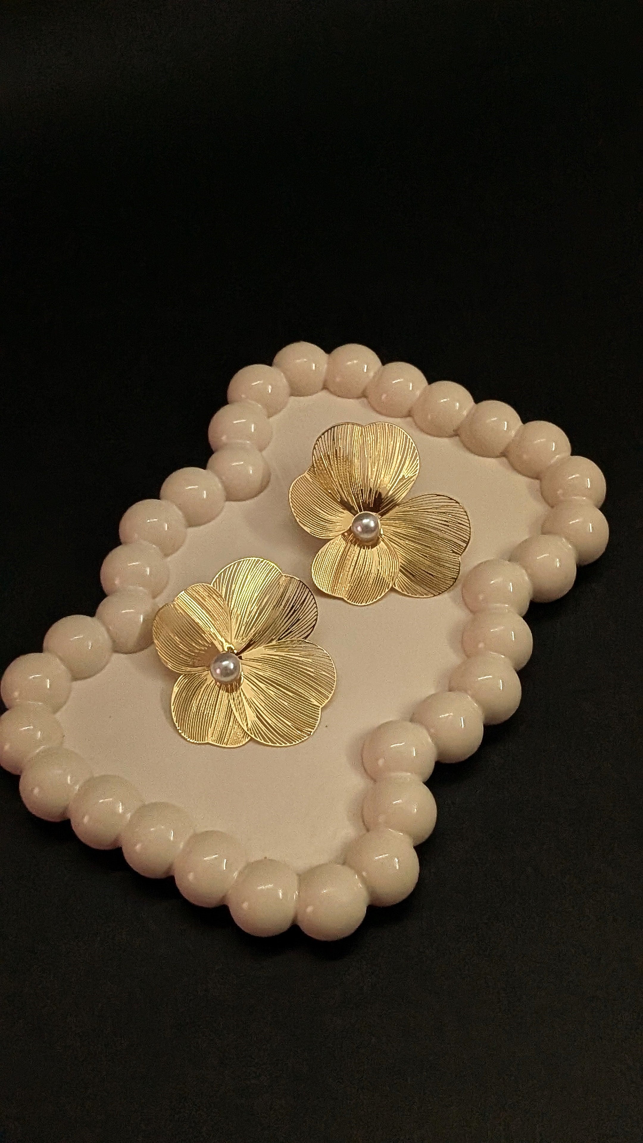 Gold flower statement earrings