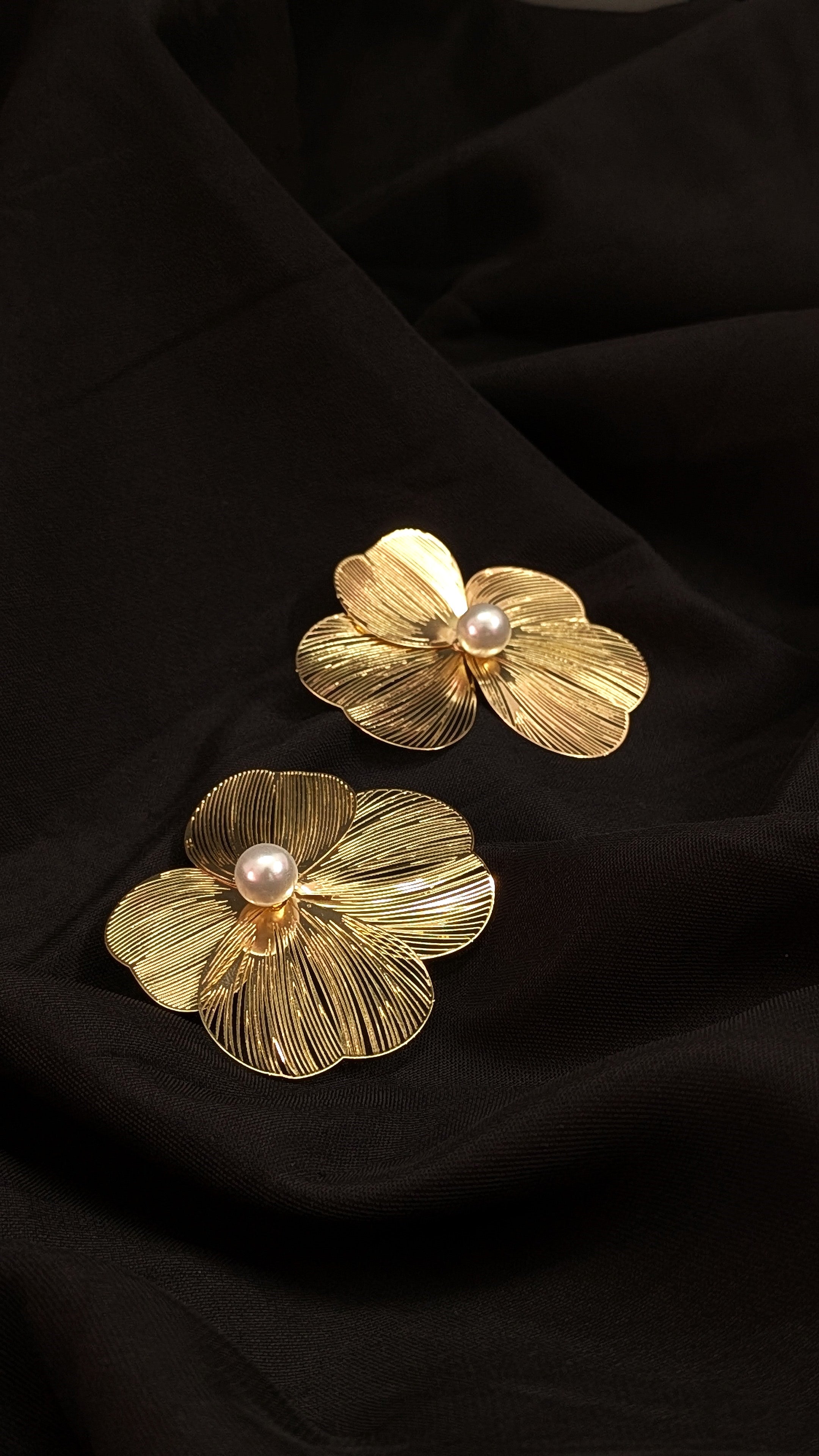 Gold flower statement earrings