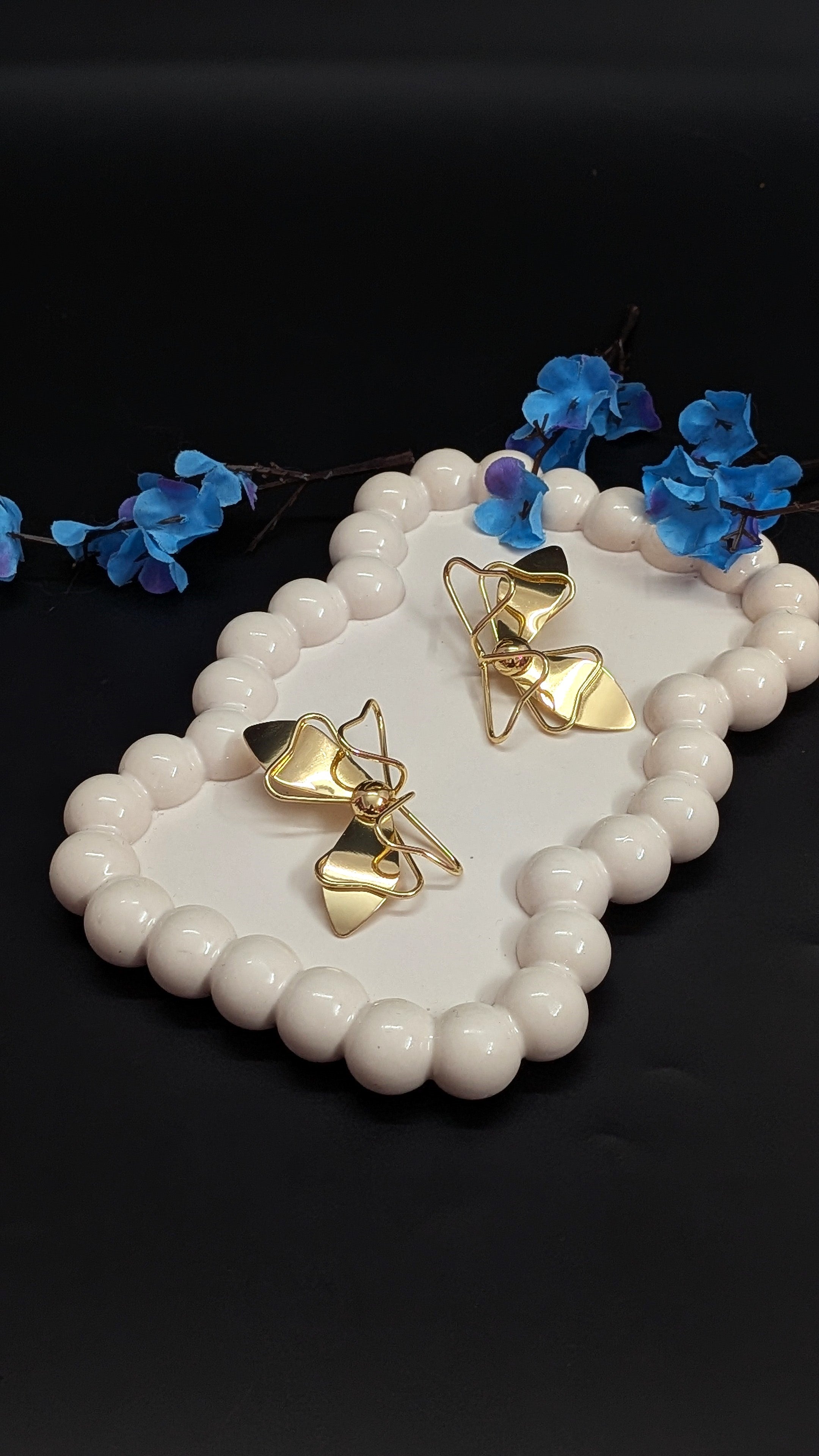 Gold bow knot earrings