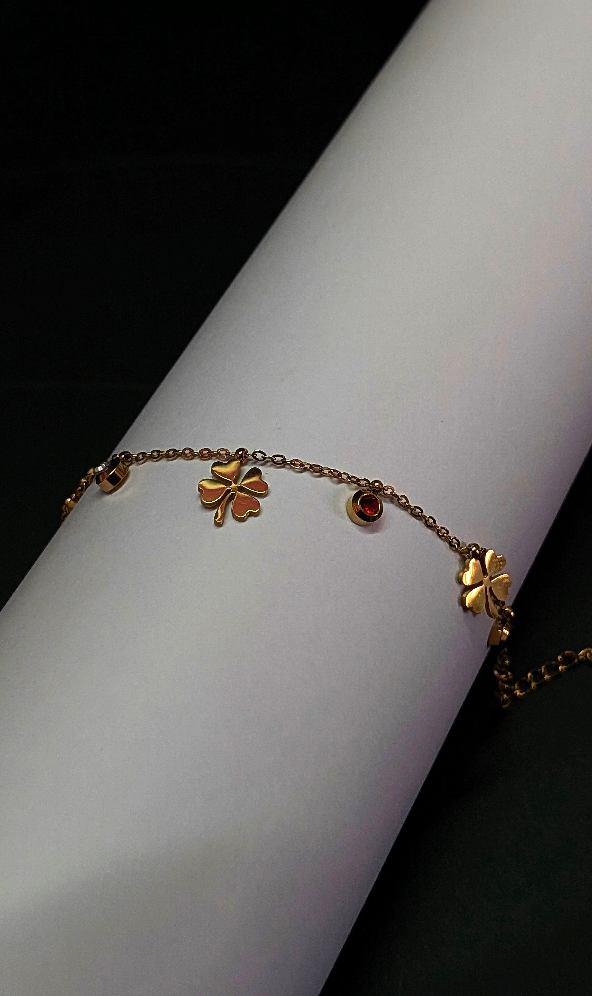 Gold four leaf lucky clover charm bracelet