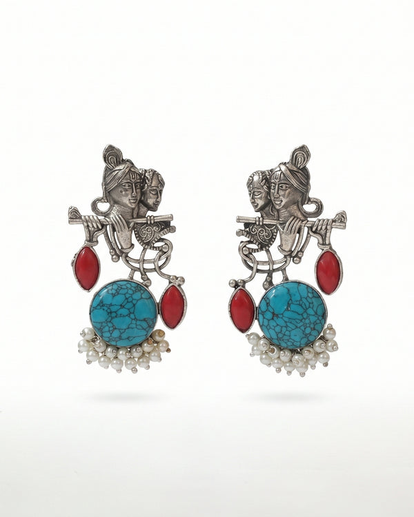 Radha Krishna Oxidized Silver Earrings with Turquoise Stone, Red Accents & Pearls
