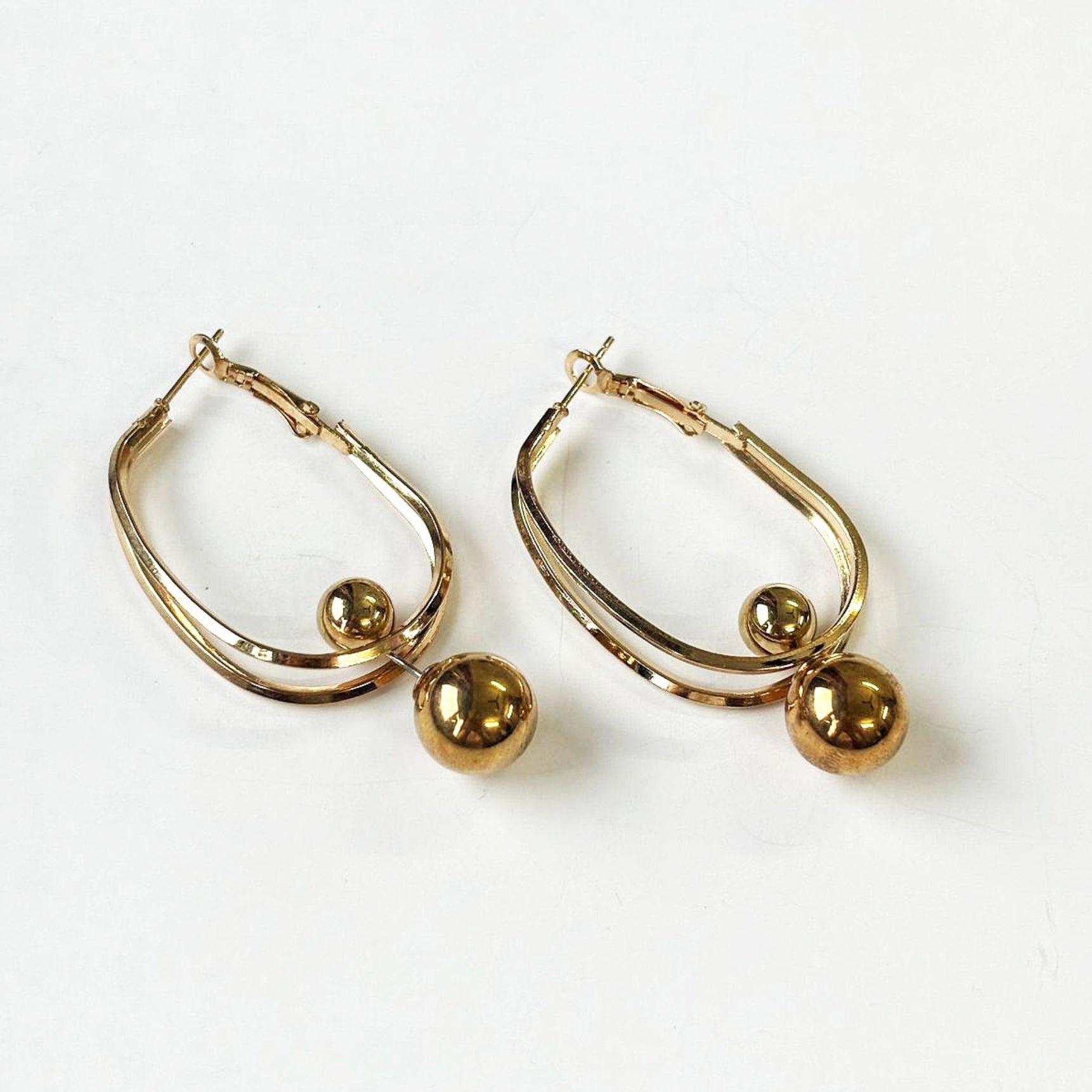 Gold Plated Rotating Hoops Earrings