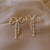 Shimmering Crystal Bow Stud Earrings