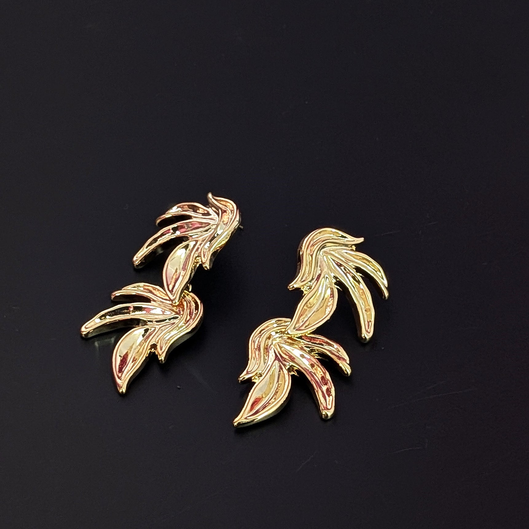 Bold Elegance Golden Double Wing Earrings