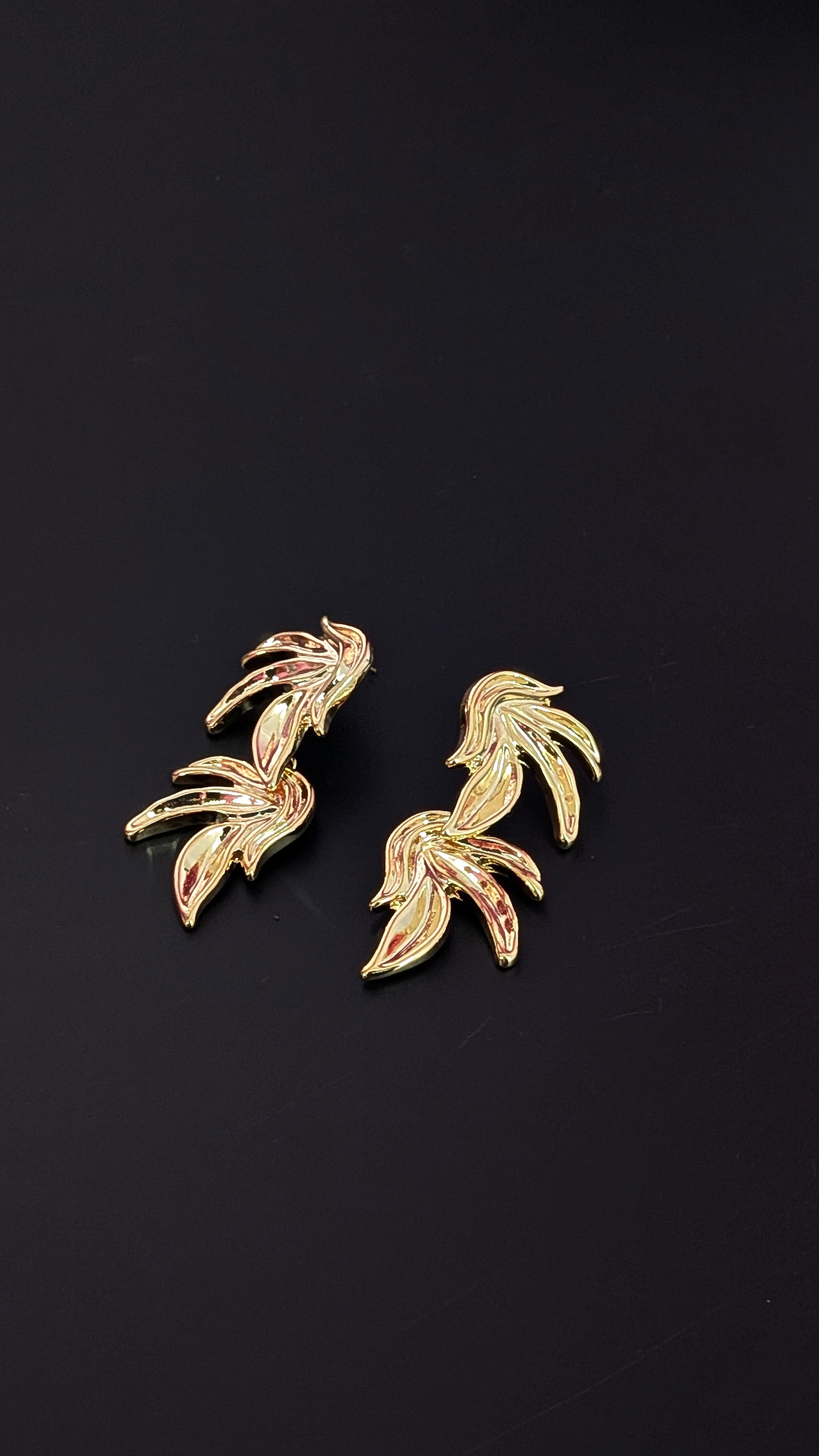 Bold Elegance Golden Double Wing Earrings