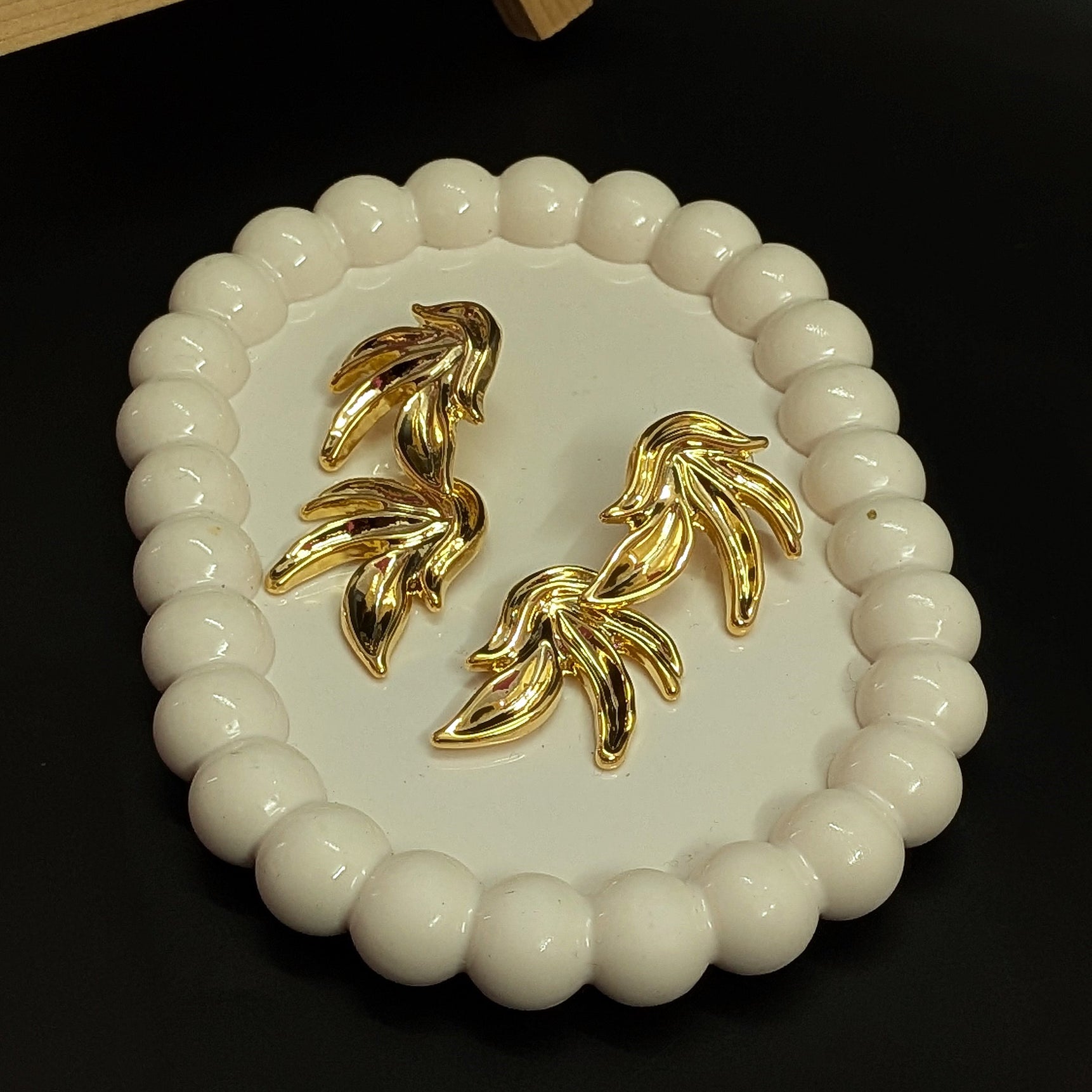 Bold Elegance Golden Double Wing Earrings