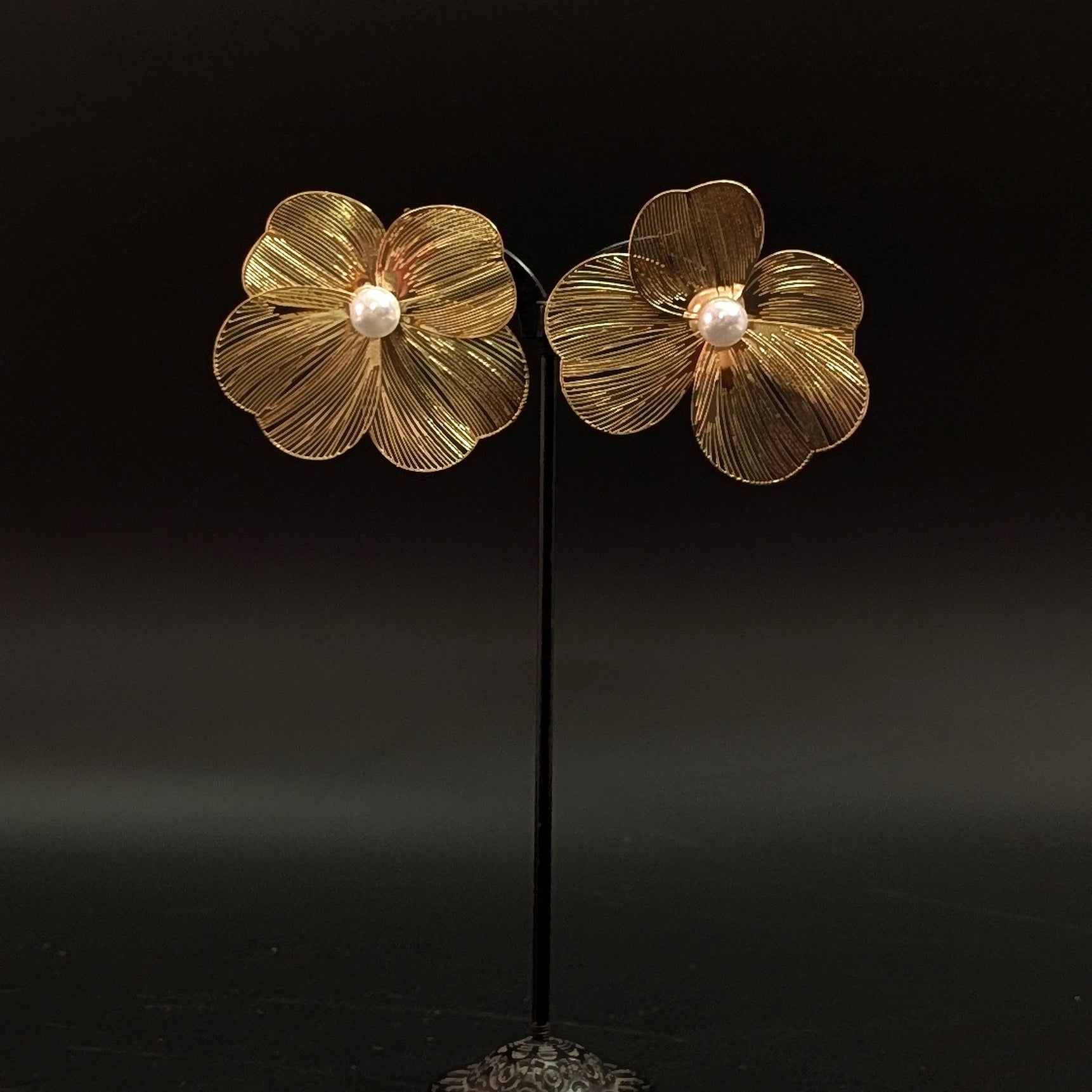 Gold flower statement earrings