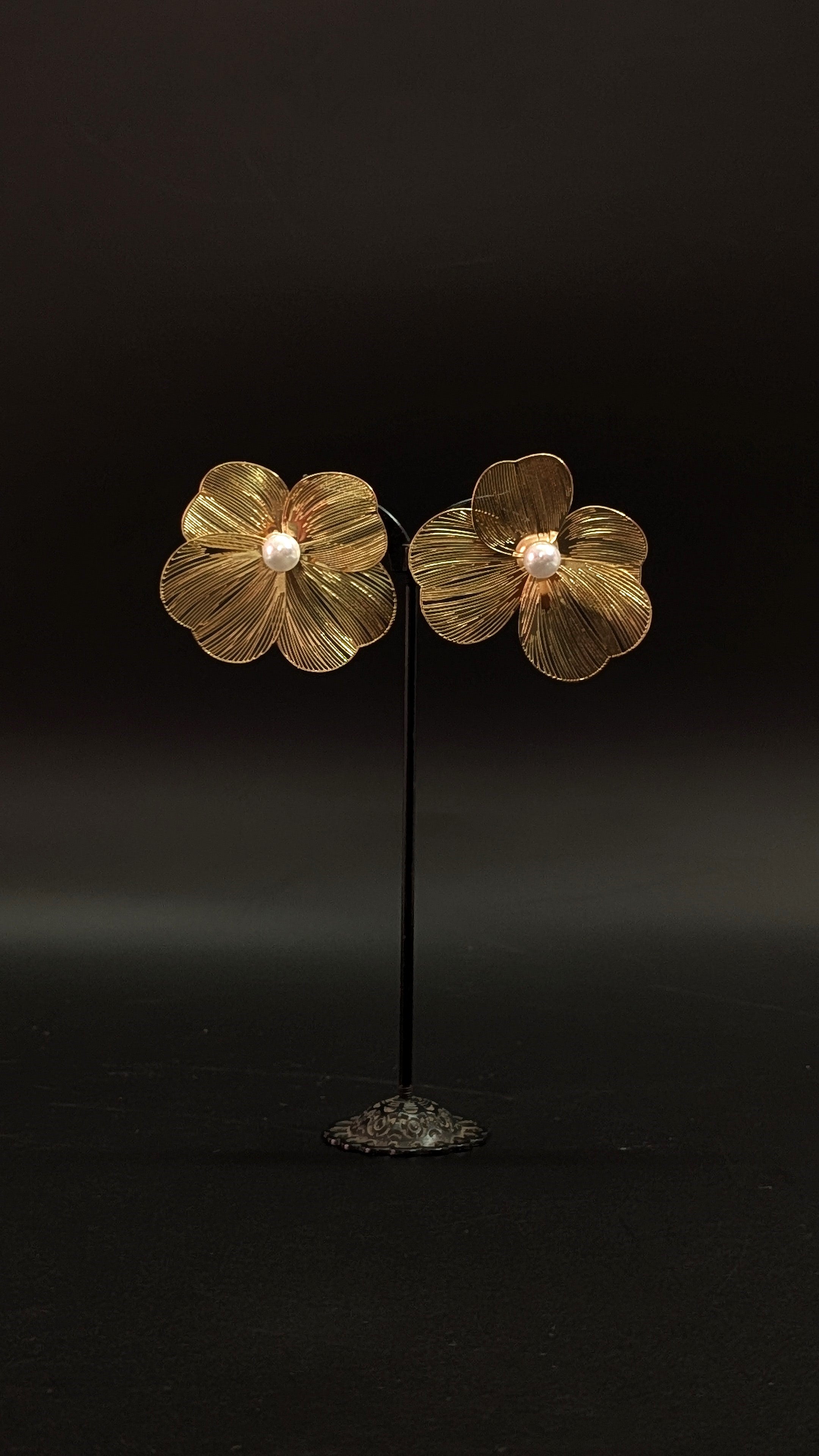 Gold flower statement earrings