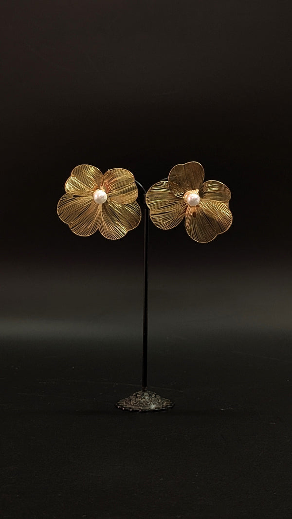 Gold flower statement earrings