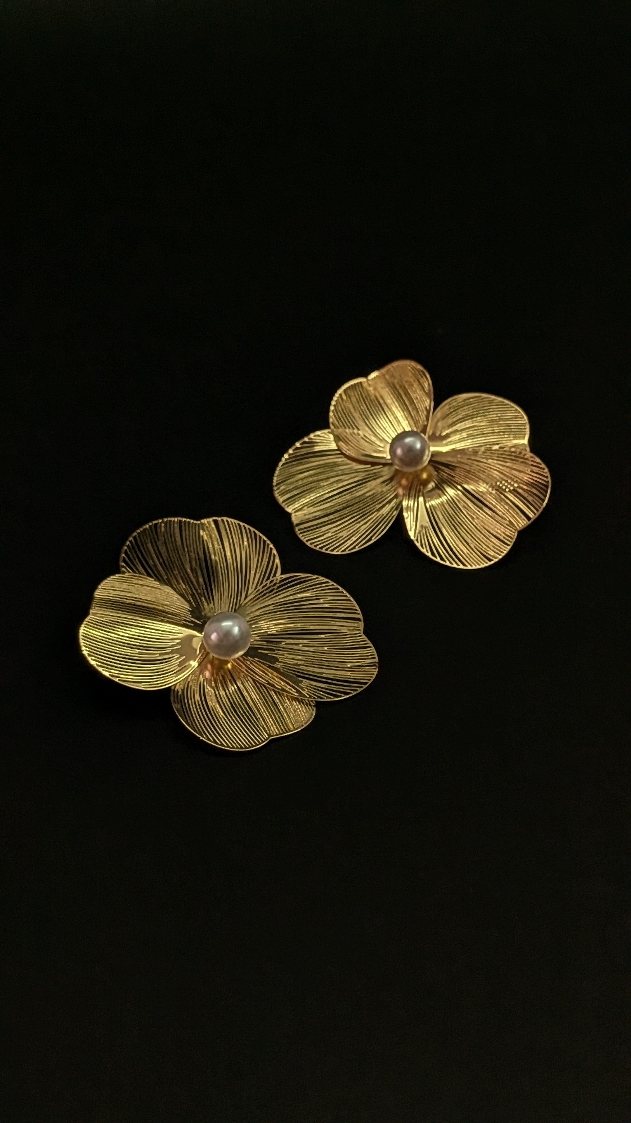 Gold flower statement earrings