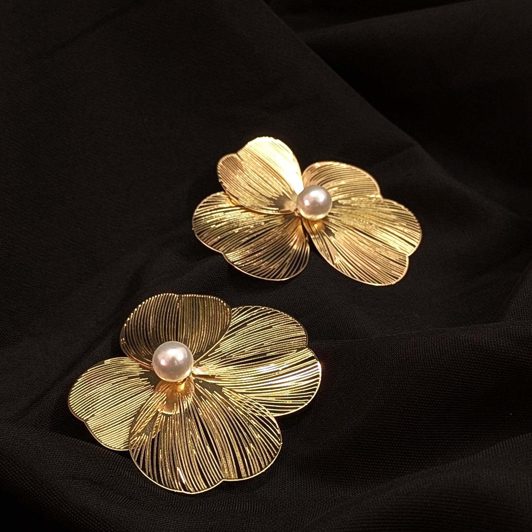 Gold flower statement earrings