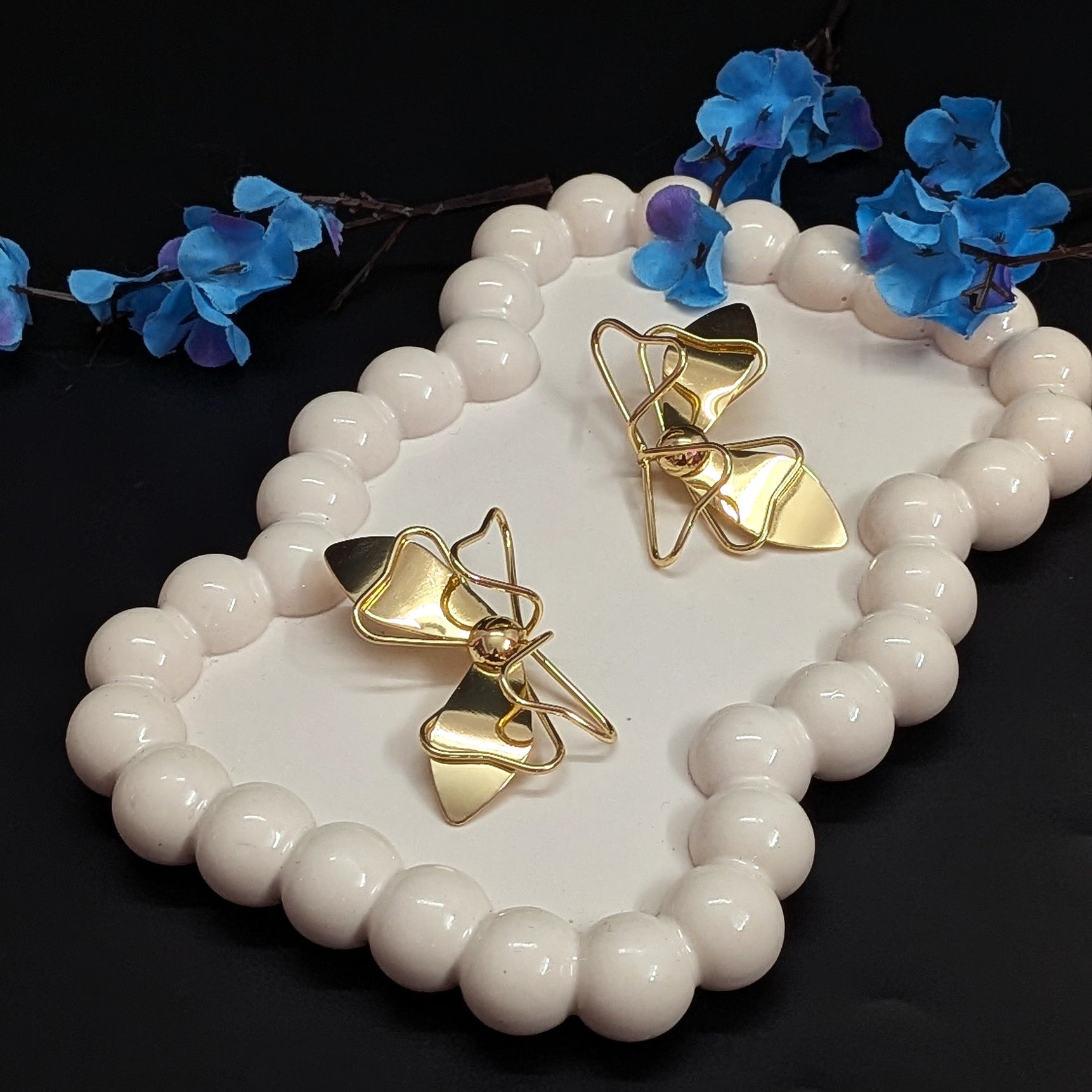 Gold bow knot earrings