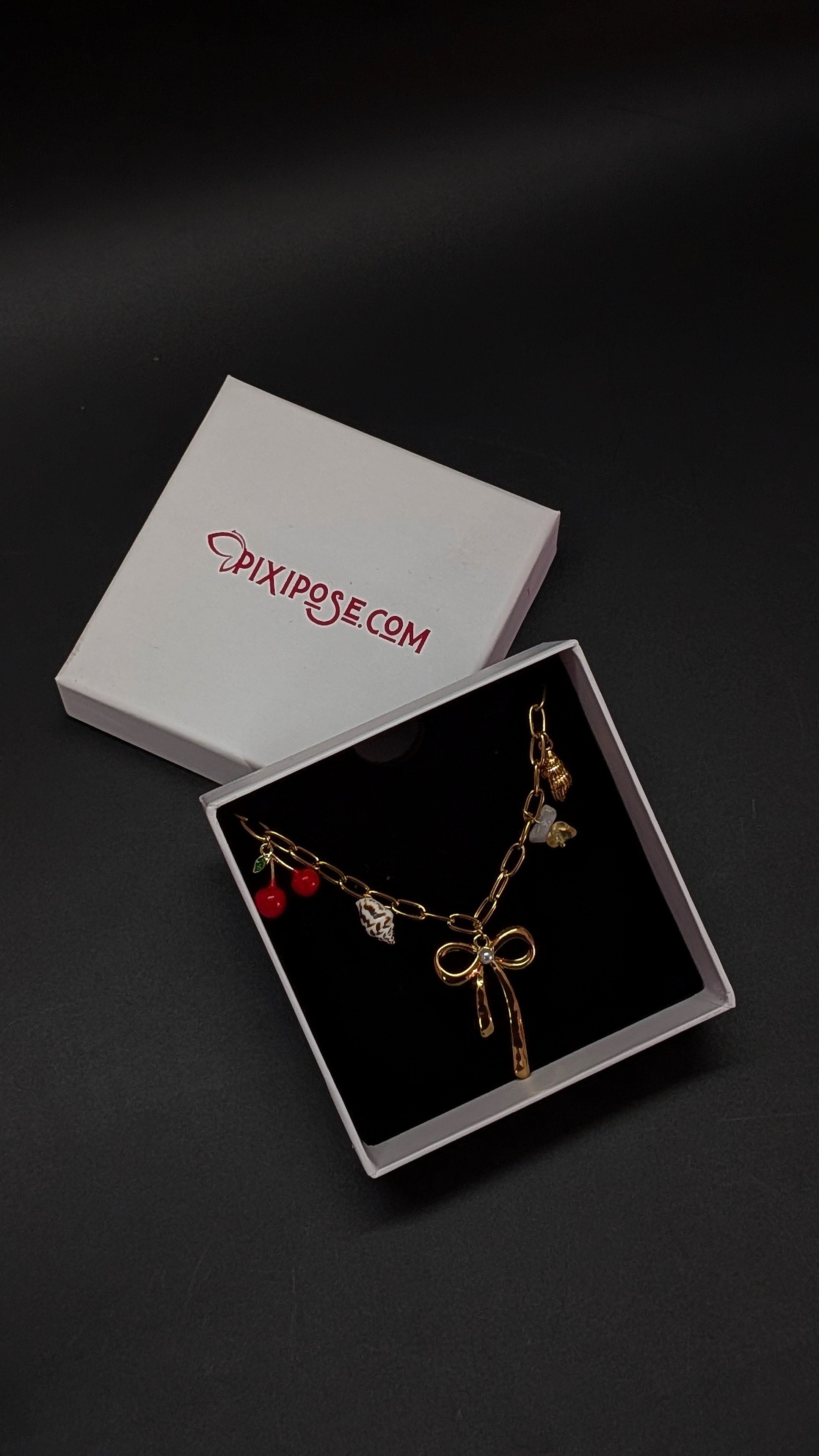 Golden Bow Pendant Charm Necklace with Cherry & Seashell Accents