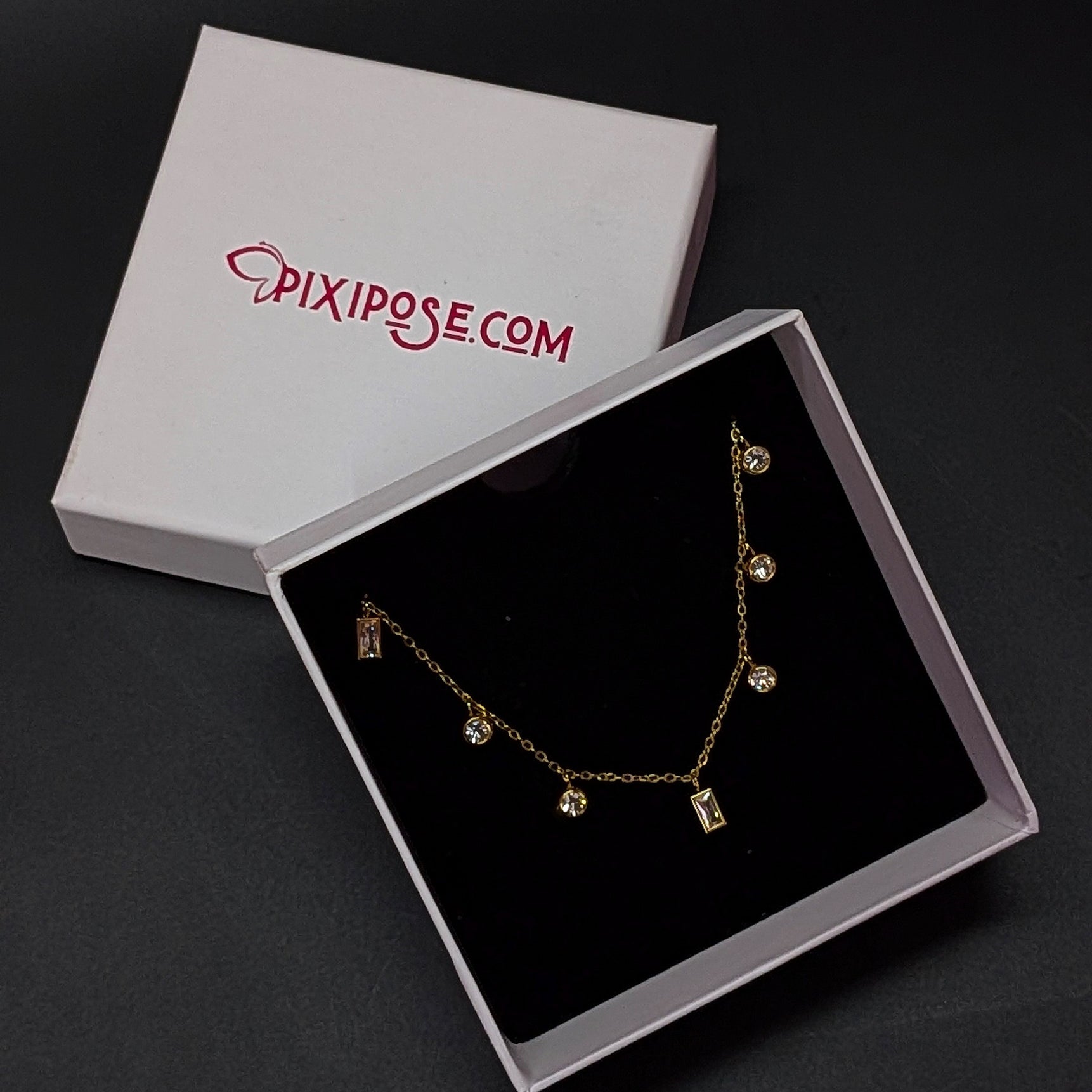 Crystal Drop Gold Finish Charm Necklace