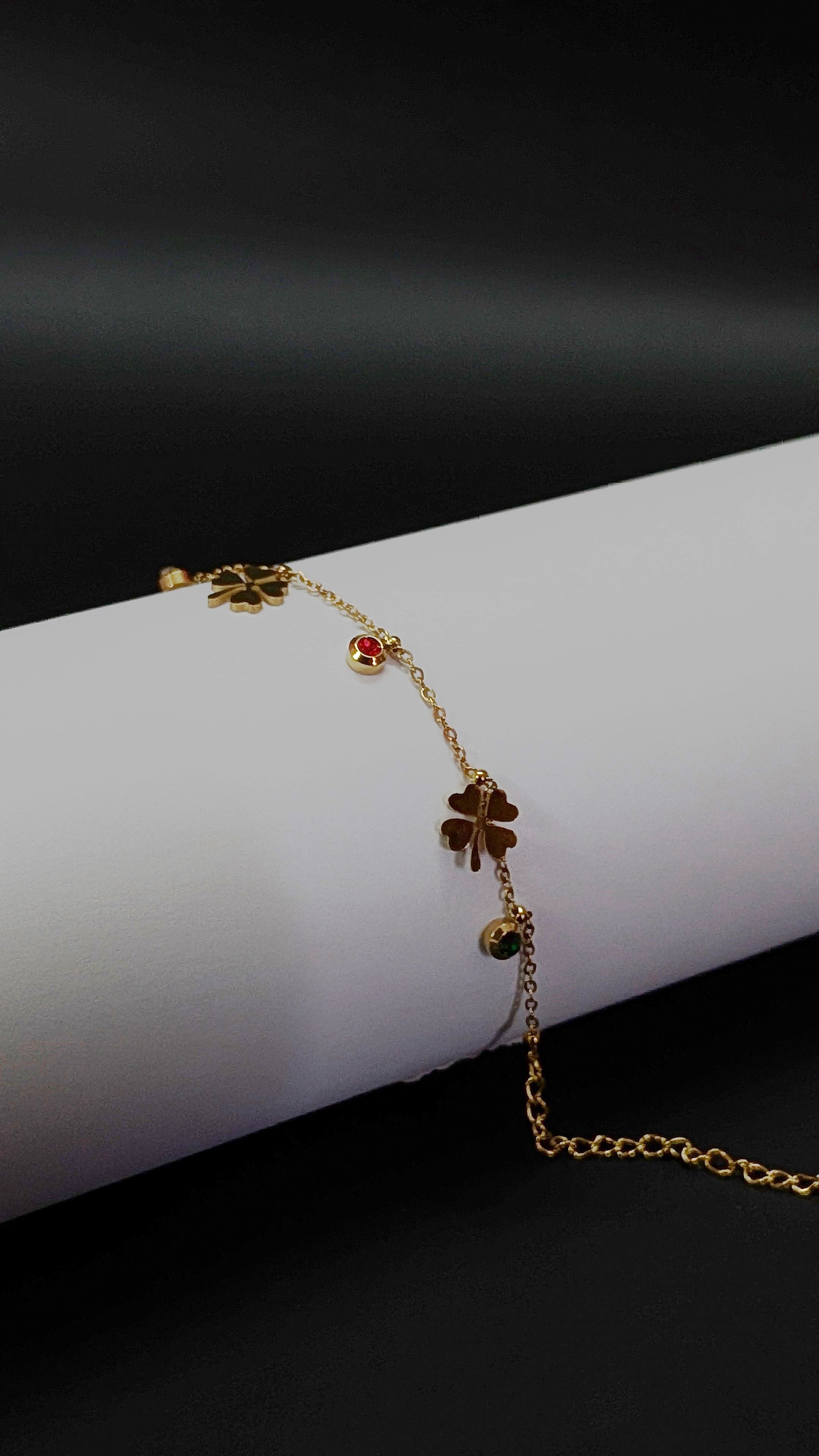 Gold four leaf lucky clover charm bracelet