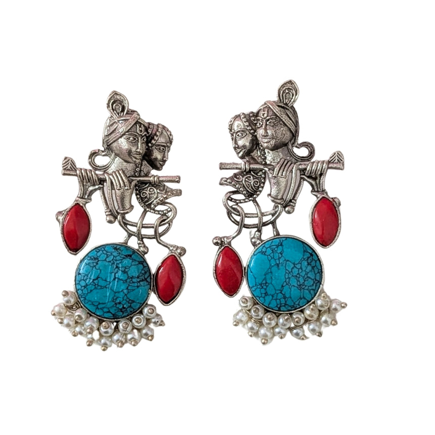 Radha Krishna Oxidized Silver Earrings with Turquoise Stone, Red Accents & Pearls