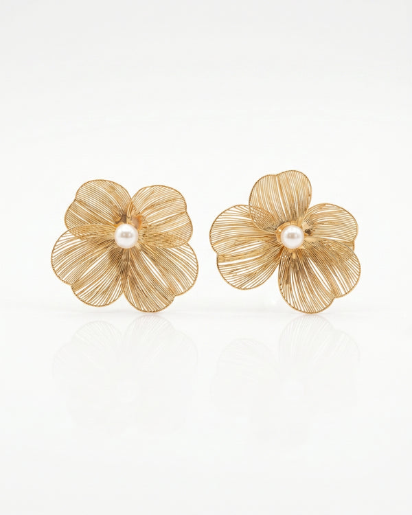 Gold flower statement earrings